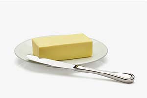 Stick of butter on plate