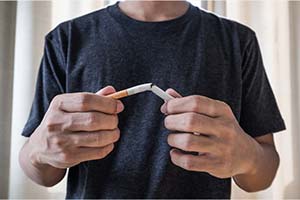Breaking a cigarette to quit smoking