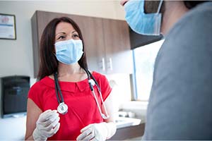 Healthcare provider consulting with patient