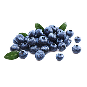 Fresh blueberries with green leaves